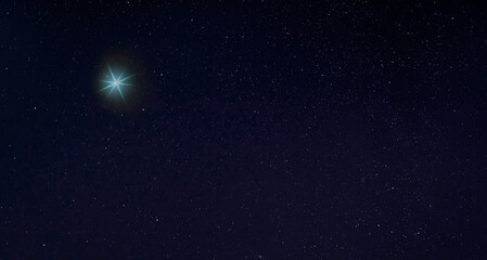 Wall Mural - Unidentified blue light in the night sky