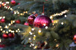 Viva magenta 2023 Christmas balls hang on a fancy tree