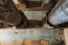 Ancient Temple With Columns With Reliefs And Inscriptions