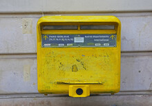 Paris, France - July 9. 2022: Closeup Of Isolated Yellow Vintage Old Mailbox, Two Insertion Slots For Local And International Mailing