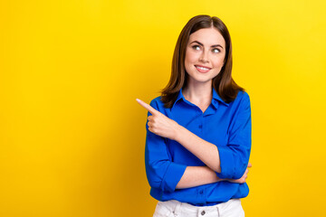 Sticker - Photo of positive adorable lady office manager arm presenting empty space recommend visit store mall isolated on yellow color background