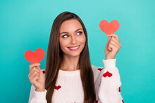 Portrait Of Gorgeous Nice Girl Toothy Smile Look Arms Hold Little Heart Cards Isolated On Cyan Color Background