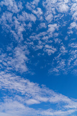 Poster - Blue sky with a white cloud background