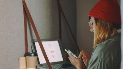 Poster - Phone, laptop and freelance with a woman entrepreneur doing remote work from home for startup business. Computer, smartphone and small business with a female employee working as a mobile freelancer