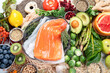 Background healthy food. Fresh fruits, vegetables and salmon. Healthy food, diet and healthy life concept.