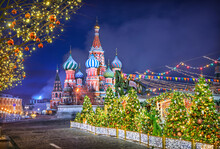 New Year And Decorated Christmas Trees On Red Square Near The Moscow Kremlin, St. Basil's Cathedral, Moscow. Caption: Happy New Year!