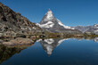 Lake reflection of the Matterhorn at the Alps in Switzerland 