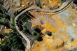 Drone aerial of copper mine with red toxic contaminated land. Environmental pollution nature contamination