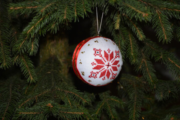 Homemade Christmas decoration. Round handmade Christmas toys with a picture .