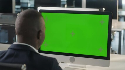 Business African-American Man Hands Working Internet on Computer On Desk. Girl Surfing on PC with Green Screen Notebook. Close Up Male Freelancer Searches For Information on The Internet