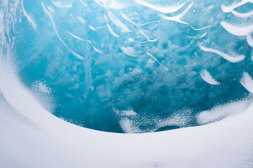 Wall Mural - The Ice Cave in Iceland. Crystal Ice Cave. Vatnajokull National Park. Inside view of the ice as a background. Winter landscapes in Iceland.