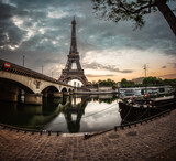 Fototapeta Paryż - Eiffel Tower be seine river at sunrise in Paris. France
