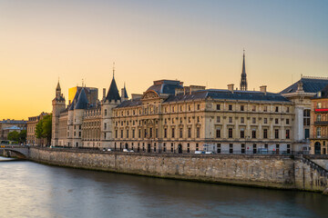 Sticker - Conciergerie palace and prison by the Seine river at sunrise in Paris. France