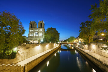 Sticker - Notre Dame cathedral at blue hour in Paris. France