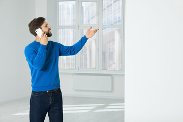 Canvas Print - Man in casual clothes talking on phone indoors, space for text