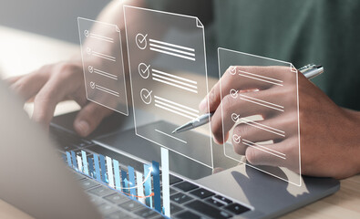 Businessman signing electronic documents on digital documents online. digital document management paperless office Signing a business contract. e-signing concept.