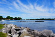 Landscape view of the waters of Sturgeon Bay, Wisconsin flooding onto the shoreline of Sturgeon Bay.