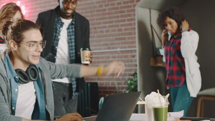 Poster - Laptop, wow and collaboration with a business man calling his team then cheering together in the office. Teamwork, winner and goal with a male employee and colleague group in celebration at work