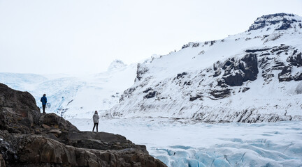 unrecognised tourist people looking at the vantajokull glacier skaftafell national park in Iceland Europe