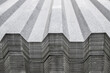 Metal profile for roof covering. Metal profiled sheeting is stored in a bundle in a warehouse for sale.