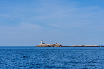 Wall Mural - First lighthouse at the Isles of Shoals in the North Atlantic Ocean in the Gulf of Maine. This Lighthouse was erected on White Island in 1820. Now it is  NH State Parks and Historic Sites 