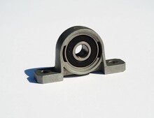 Metal Ball Bearing In Housing. Two Bolt Flanged Housing Unit. Metal Ball Bearing Pillow Block
