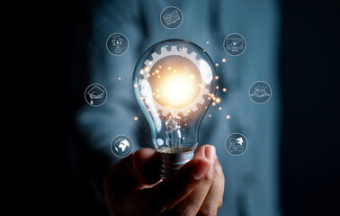 man hand holding lightbulb with learning educate and graduation concept. study knowledge to creative