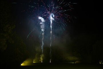 Sticker - Beautiful colorful firework show at a park at night