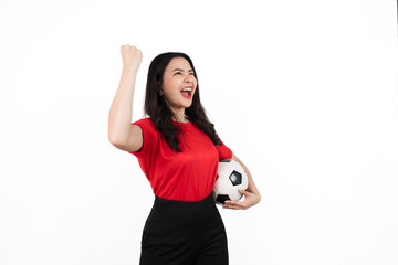 Wall Mural - Female sports fan isolated, confident asian soccer fans wearing red t-shirt isolated on white background. holding football
