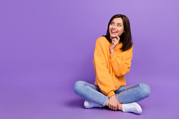 Wall Mural - Photo of adorale lady sit floor stylish orange autumn clothes look empty space hallowen celebration isolated on purple color background