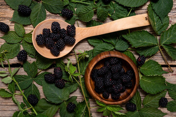 Wall Mural - Blackberries on a old wooden table