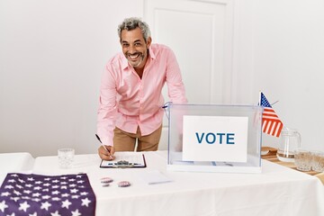 Poster - Middle age grey-haired man electoral table president writing on clipboard at electoral college