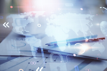 Poster - Double exposure of desktop with computer and world map hologram. International data network concept.