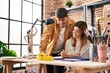 © Krakenimages.com - Mand and woman artist couple drawing on notebook at art studio