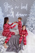 © Olena - People in same family look red pajamas playing at home in christmas day. Happy funny kids daughter, son with mother spend time, enjoying being together in decorated winter bedroom. New Year holidays