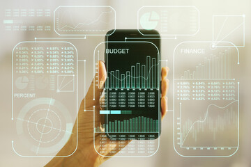 Poster - Multi exposure of abstract statistics data hologram interface and hand with cellphone on background, computing and analytics concept