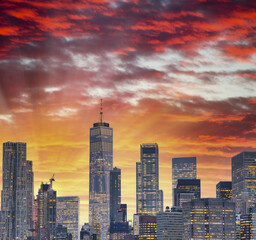 Sticker - New York City at sunset. Panoramic view of Downtown Manhattan buildings from the water