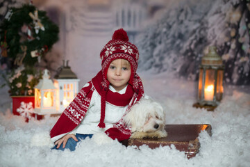 Poster - Blond toddler child with christmas clothes , walking in the snow, playing