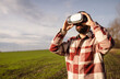 © bugarskipavle3 - Young man standing in a wheat field at sunset in virtual reality glasses