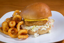 Fish Fillet  On Cole Slaw With Curley  Fries