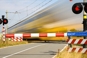 Wall Mural - Den Helder, Netherlands. August 2022. Long exposure shoot of passing train.