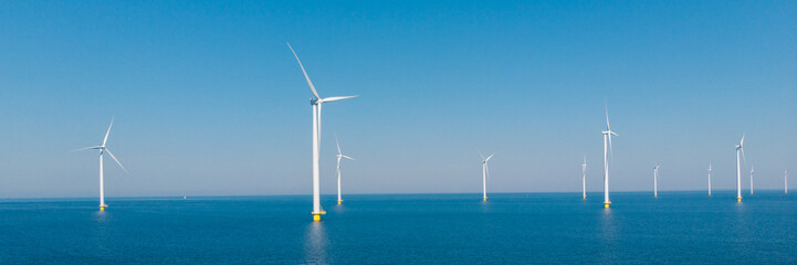 Wall Mural - Windmill turbines at sea , drone view at windmill turbines in the ocean