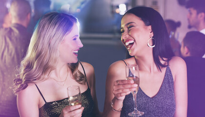 Poster - Friends, drinks and party at nightclub to celebrate champagne glass, happiness and new years or birthday energy with funny conversation. Girls at club, event or disco for happy hour celebration