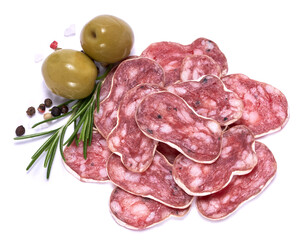 Wall Mural - slices of Spanish Fuet thin dried salami sausage isolated on a white background