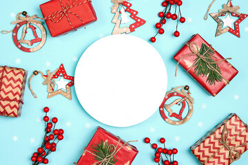  Round greeting card with Christmas decorations on a blue background.