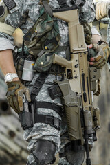 Wall Mural - Soldier military suit up guns and gears with assault rifle weapon 