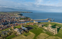 Aerial View Of Whitby In North Yorkshire. Harbour And Abbey Overlooking The Town Near The Famous 199 Steps To The Dracula Church 