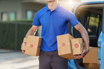 Wall Mural - Asian courier with parcel and delivery logistic concept. Delivery man holding the parcel