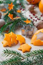 Zero Waste Handmade Christmas Decor  - A Craft Made By Cutting In Star Shape The Scrap Orange Peel. Once They Dry Can Be Used As Ornaments To Decorate A Christmas Tree.