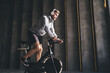 © BullRun - Sporty man training on bicycle machine